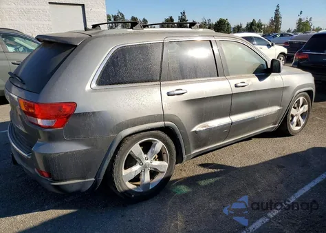 2012 Jeep Grand Cherokee Overland z USA, uszkodzony, nr VIN 1C4RJFCG2CC132275